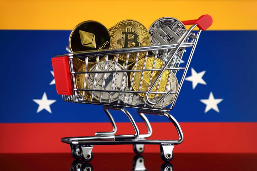 Shopping Trolley full of physical version of Cryptocurrencies (Bitcoin, Litecoin, Dash, Ethereum) and Venezuela Flag. Source: shutterstock.com