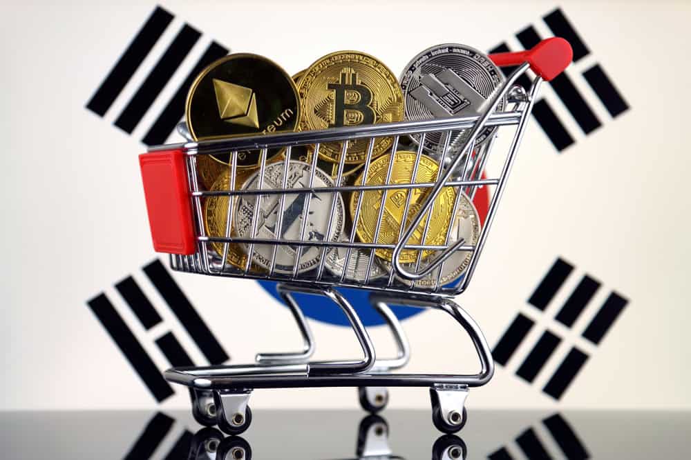South Korea flag and shopping trolley full of physical version of Cryptocurrencies (Bitcoin, Litecoin, Dash, Ethereum). Source: Shutterstock.com