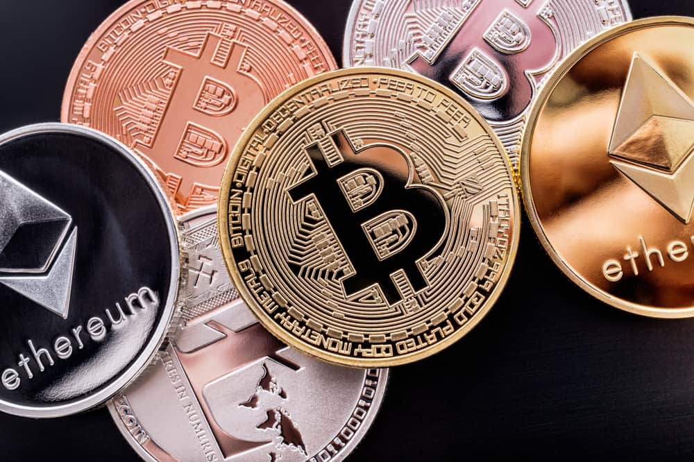 Stacked cryptocurrency coins. Source: Shutterstock.com