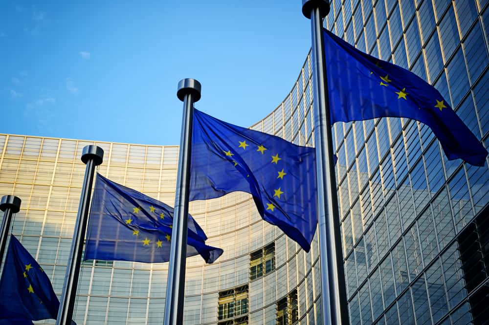 EU flags in front of European Commission in Brussels. SOurce: shutterstock.com