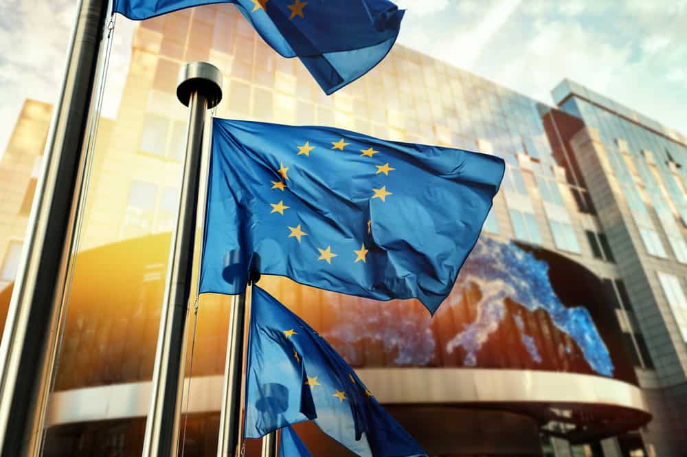 EU flags waving in front of European Parliament building. Brussels, Belgium. Source: shutterstock.com